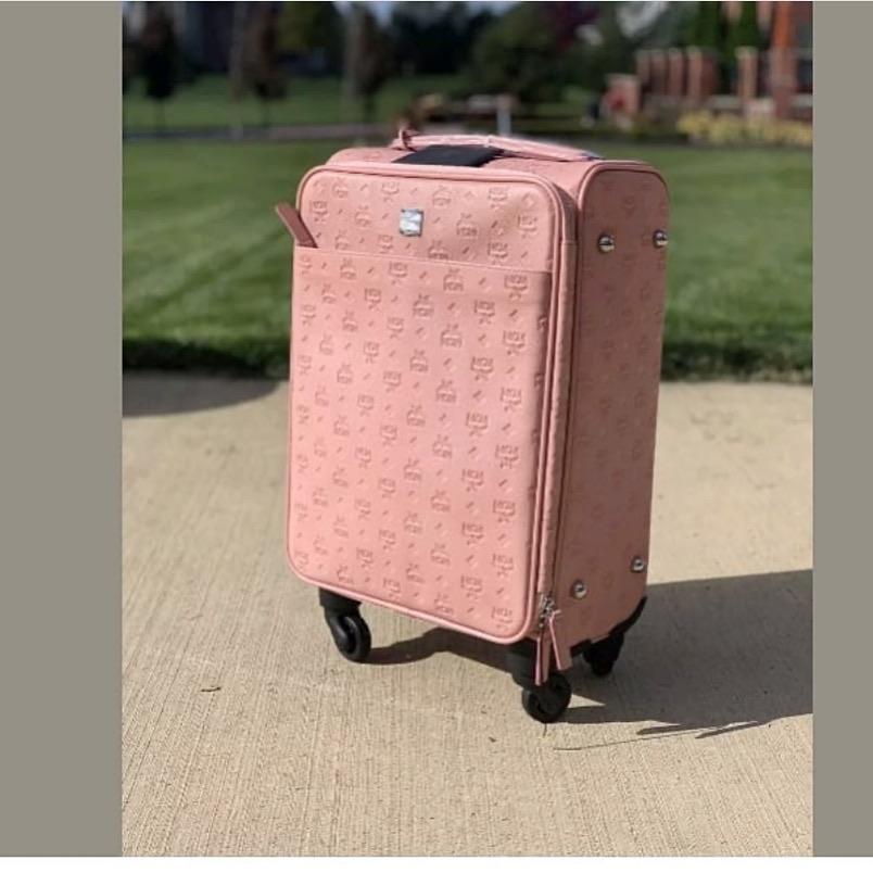 Mcm luggage pink Clearance